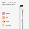 Image for "Works Best With:. Text reads "Liquids, Creams & Powders" and follows a list "Eyeshadow", "Serum" "Concealer" and "Setting Powder"