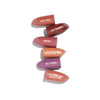Five lipstick shades labeled: Off Pink, All That, Berry, What-Eh-Ver!, Go There!, and Pink Smoothie, displayed in a vertical arrangement.