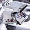 Image of an eyeshadow palette. Two palettes of the same, one closed and one open showcasing the colors