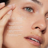 Close-up of a person applying a skincare product near the eye area, with step-by-step usage instructions: apply drops on fingertips, dab around eyes, massage, and use alone or before makeup.