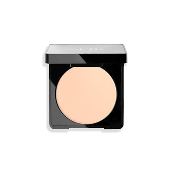 Compact powder in a sleek black case, featuring a light beige shade suitable for a smooth, matte finish.