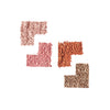 Four shades of crushed eyeshadow in pink, orange, and brown tones arranged in square segments on a white background.