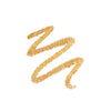 A textured, zigzag swatch of shimmering gold makeup, showcasing its metallic finish on a white background.