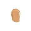A smooth, creamy swipe of light beige foundation displayed on a plain white background.