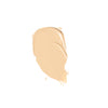 A smooth, creamy beige makeup swatch with a glossy texture.