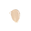 A creamy beige makeup swatch with a smooth texture on a white background.