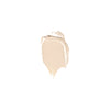 A smooth, creamy swatch of beige makeup product on a white background.