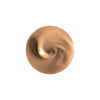 A smooth swirl of creamy beige liquid makeup with a glossy finish.