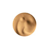 Smooth, creamy swirl of beige cosmetic product with subtle highlights.