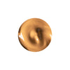 Smooth, creamy swirl of caramel-colored substance with a glossy finish.