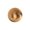 Smooth swirl of creamy beige liquid foundation on a white background.