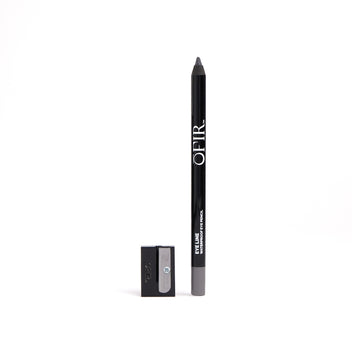 A black waterproof eye pencil with the brand name "OFIR" printed on it, accompanied by a compact sharpener.