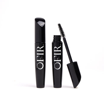 Two sleek black mascara tubes, one closed and one open with the brush visible, featuring bold white branding.